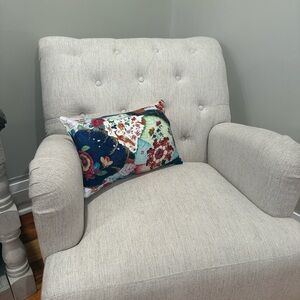 Floral Accent Pillow on Cream Armchair